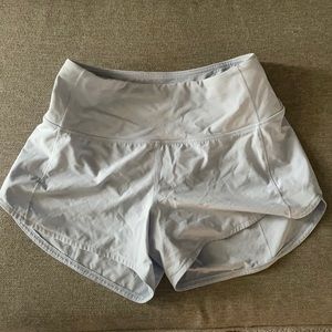 LULULEMON speed ups (4 inch) size 4, light blue, perfect condition!